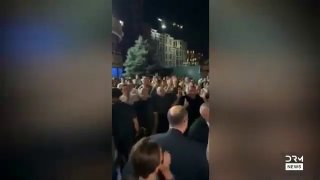 Павел Латушка, бывший министр культуры Беларуси, на фоне флага