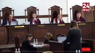 Министр юстиции Србуи Галян выступает с заявлением о результатах выборов в Аджапняке.