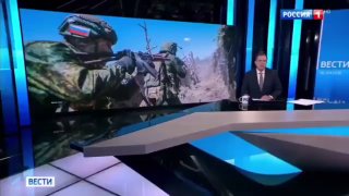 Телевизионная студия с логотипом российского канала, обсуждающая Карабах, в контексте Аджапняка (Ереван)